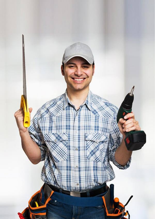 handyman holding power tools